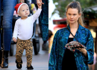 Мама мини-Санты: беременная Бехати Принслу на прогулке с годовалой дочерью Дасти Роуз